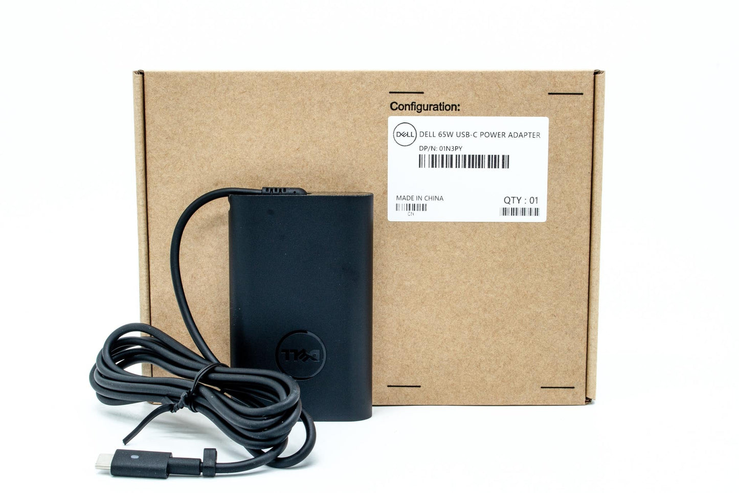 Dell 65W AC adapter with 19.5V output, USB Type-C connector, compatible with various Dell notebooks, indoor use only.