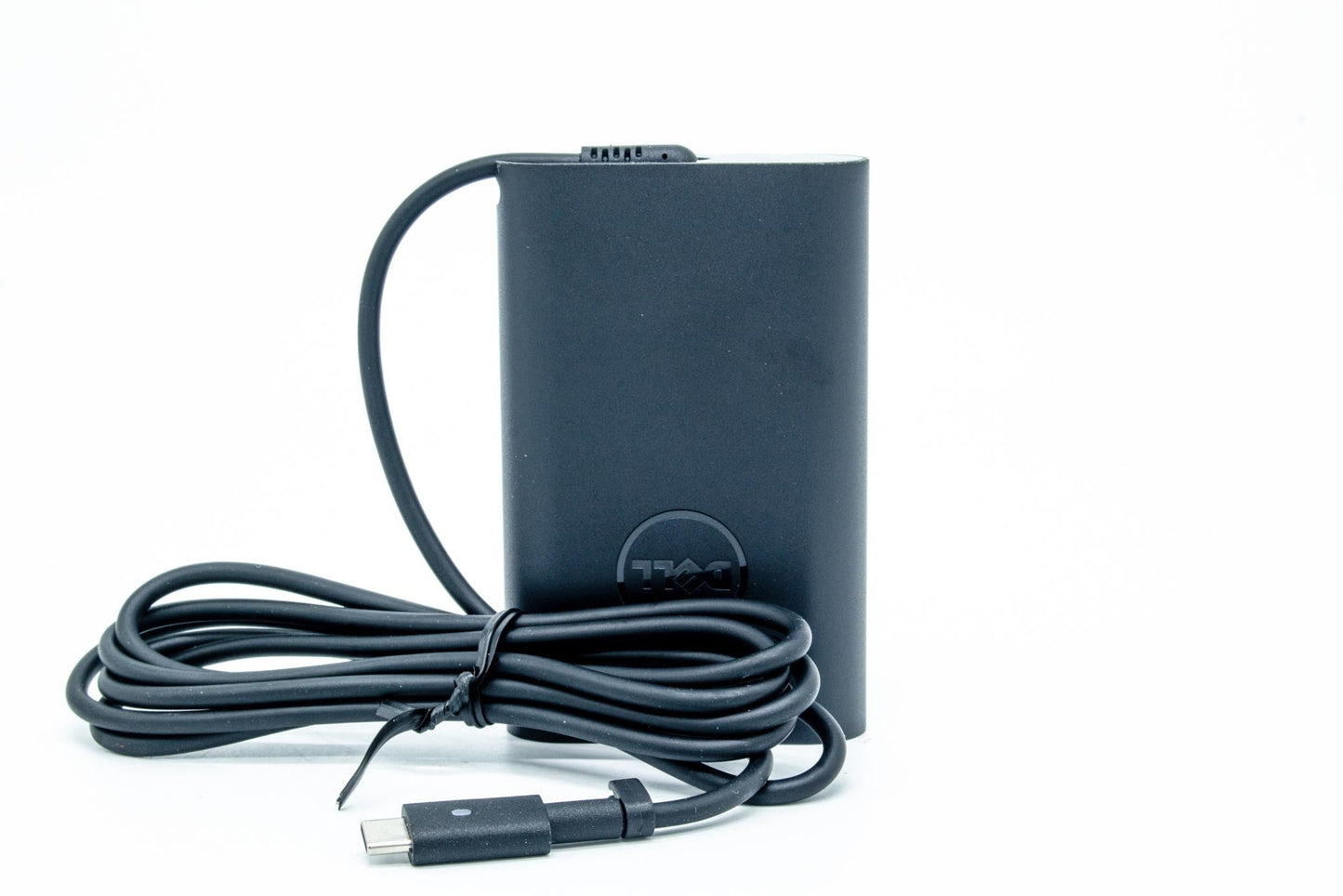 Dell 65W AC adapter with 19.5V output, USB Type-C connector, compatible with various Dell notebooks, indoor use only.