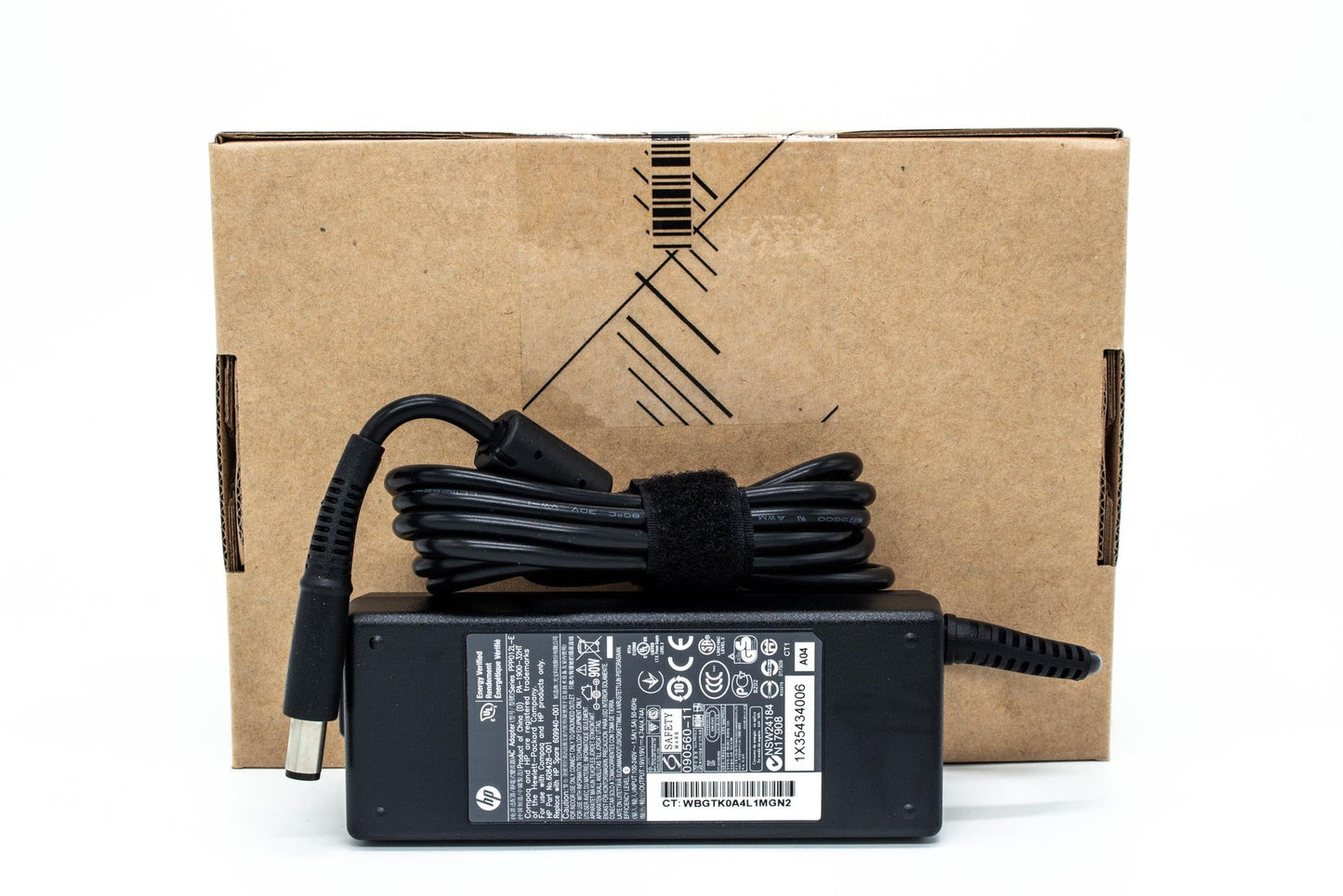 genuine HP AC adapter, which is a laptop charge