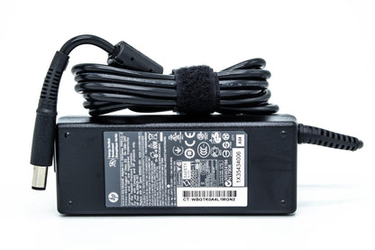 genuine HP AC adapter, which is a laptop charge